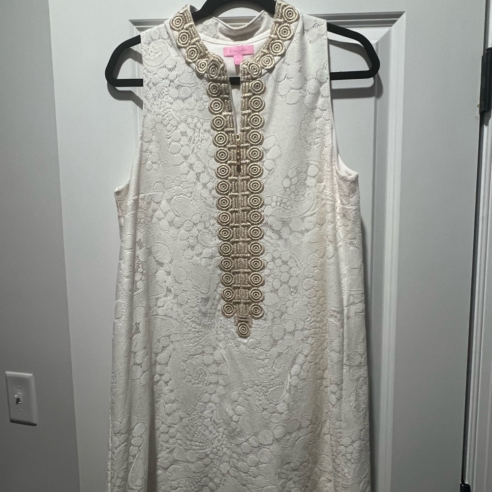 Elegant White Sleeveless Dress with Gold Accents